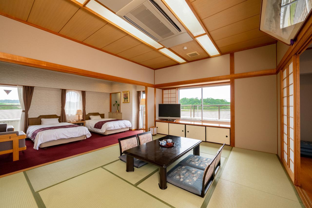 Awara Kitagata Onsen Kohanso Hana Yurari Extérieur photo